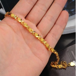 Bracelet Élégant Plaqué Or 18 Carats Pour Femme Avec Une Longue Histoire