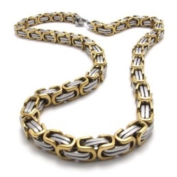 Ensemble De Bijoux En Titane De Qualité Stable Et Aux Couleurs Finement Travaillées, Comprenant Un Collier Et Un Bracelet