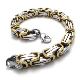 Ensemble De Bijoux En Titane De Qualité Stable Et Aux Couleurs Finement Travaillées, Comprenant Un Collier Et Un Bracelet
